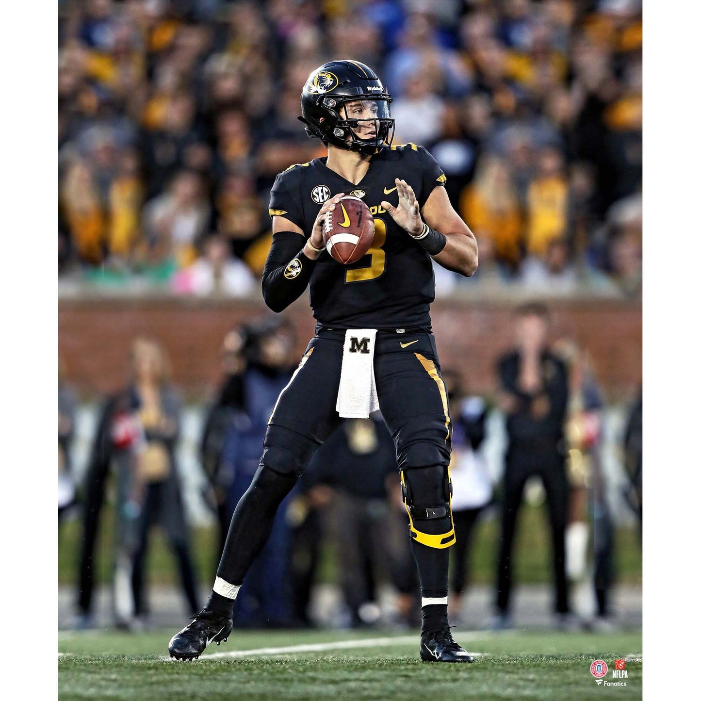 Drew Lock Missouri Tigers Unsigned Drop Back Pass Photograph