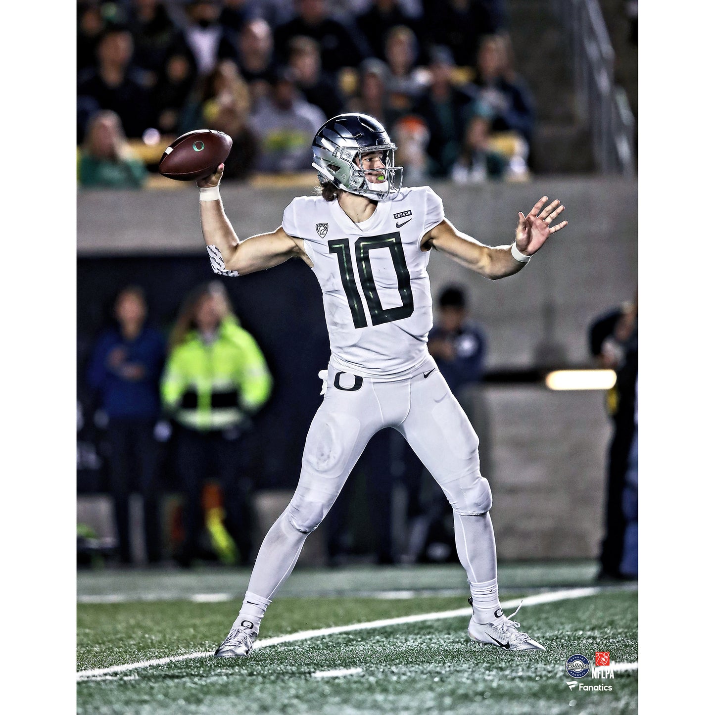 Justin Herbert Oregon Ducks Unsigned All White Throwing Photograph