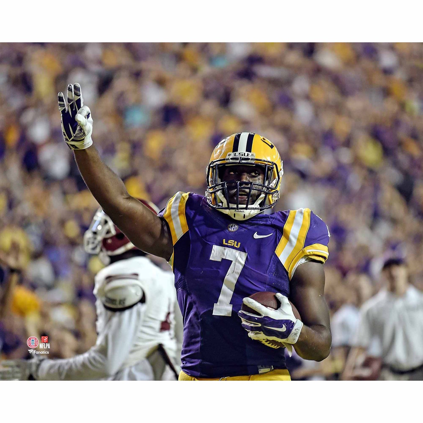 Leonard Fournette LSU Tigers Unsigned Purple Jersey Celebrating After Touchdown Photograph