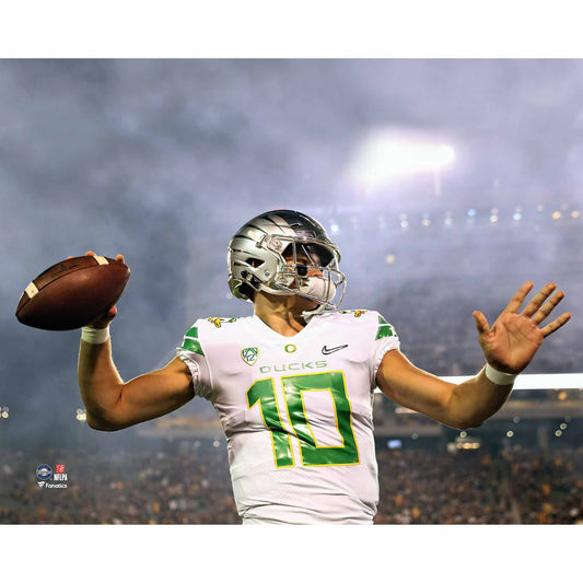 Justin Herbert Oregon Ducks Unsigned White Jersey Warming Up Photograph