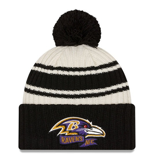 Men's New Era Cream/Black Baltimore Ravens 2022 Sideline Sport Cuffed Pom Knit Hat